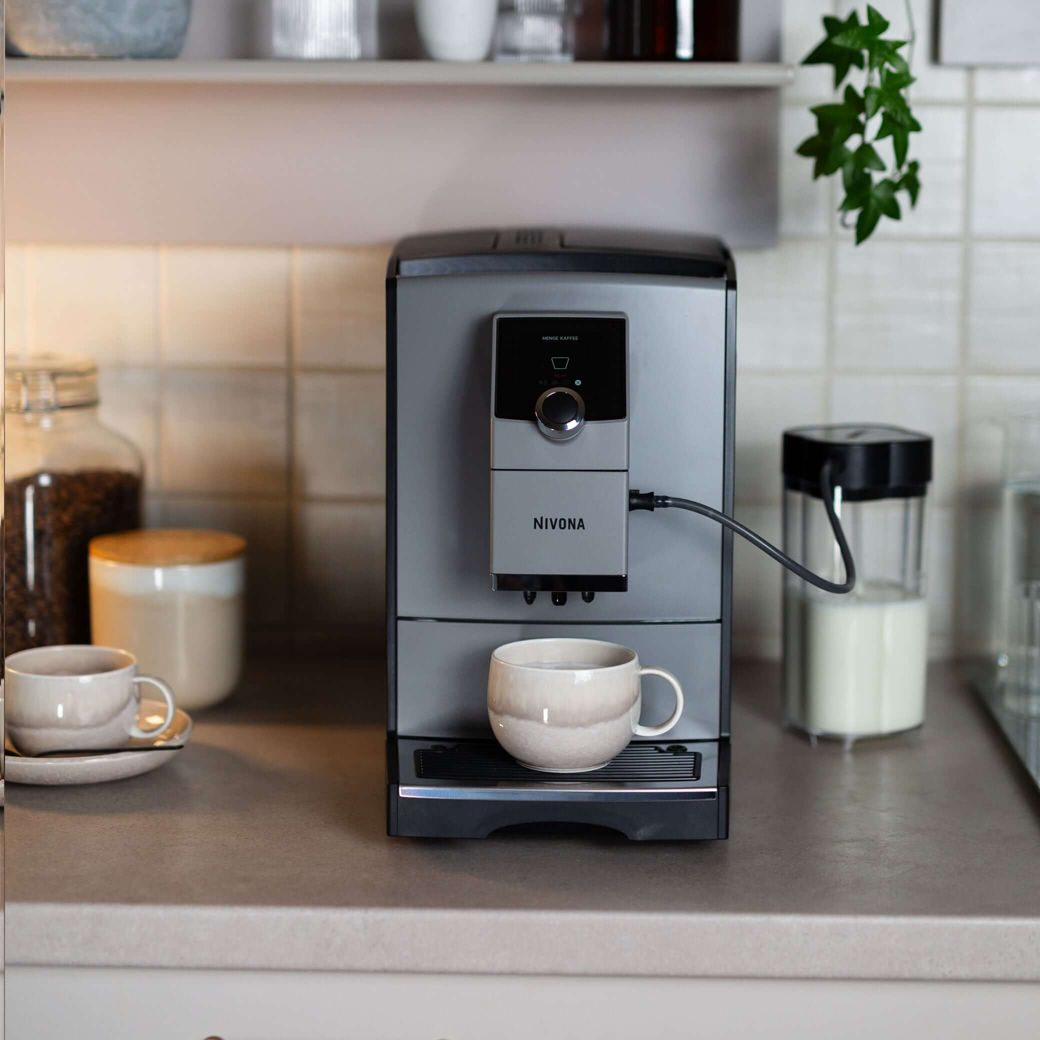 NICR 793 CafeRomatica Fully Automatic Espresso Machine on kitchen counter with two cups of coffee.
