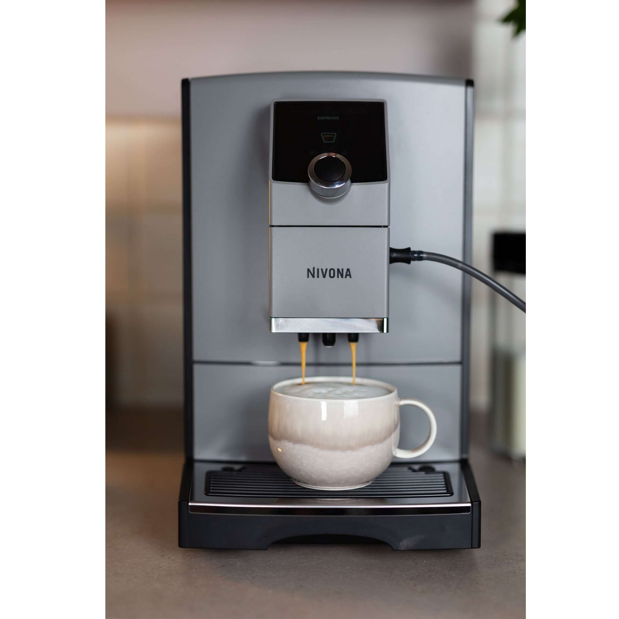 NICR 793 CafeRomatica Fully Automatic Espresso Machine brewing coffee into a mug
