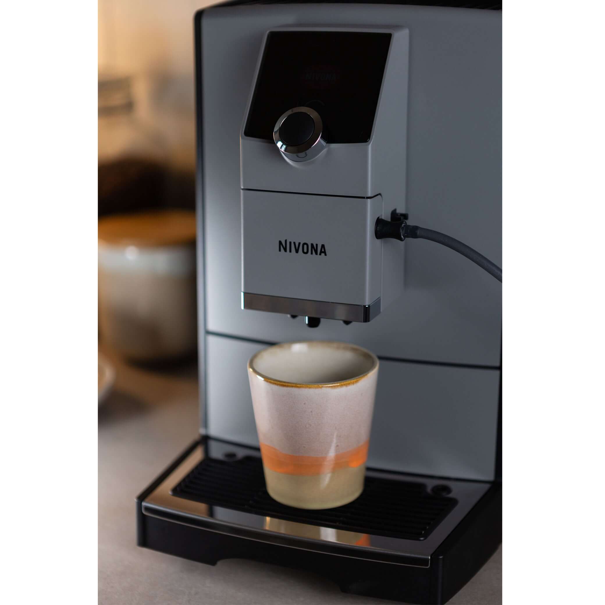 NICR 793 CafeRomatica Fully Automatic Espresso Machine brewing a cup of coffee.