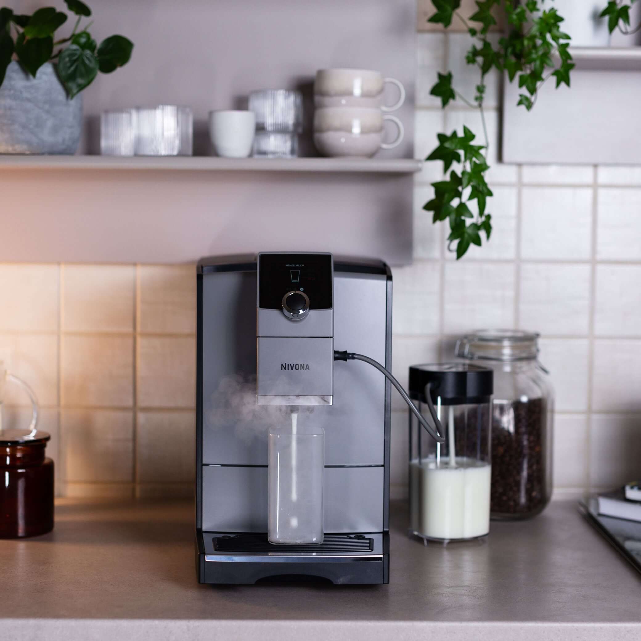 NICR 793 CafeRomatica Fully Automatic Espresso Machine on kitchen countertop with coffee accessories.