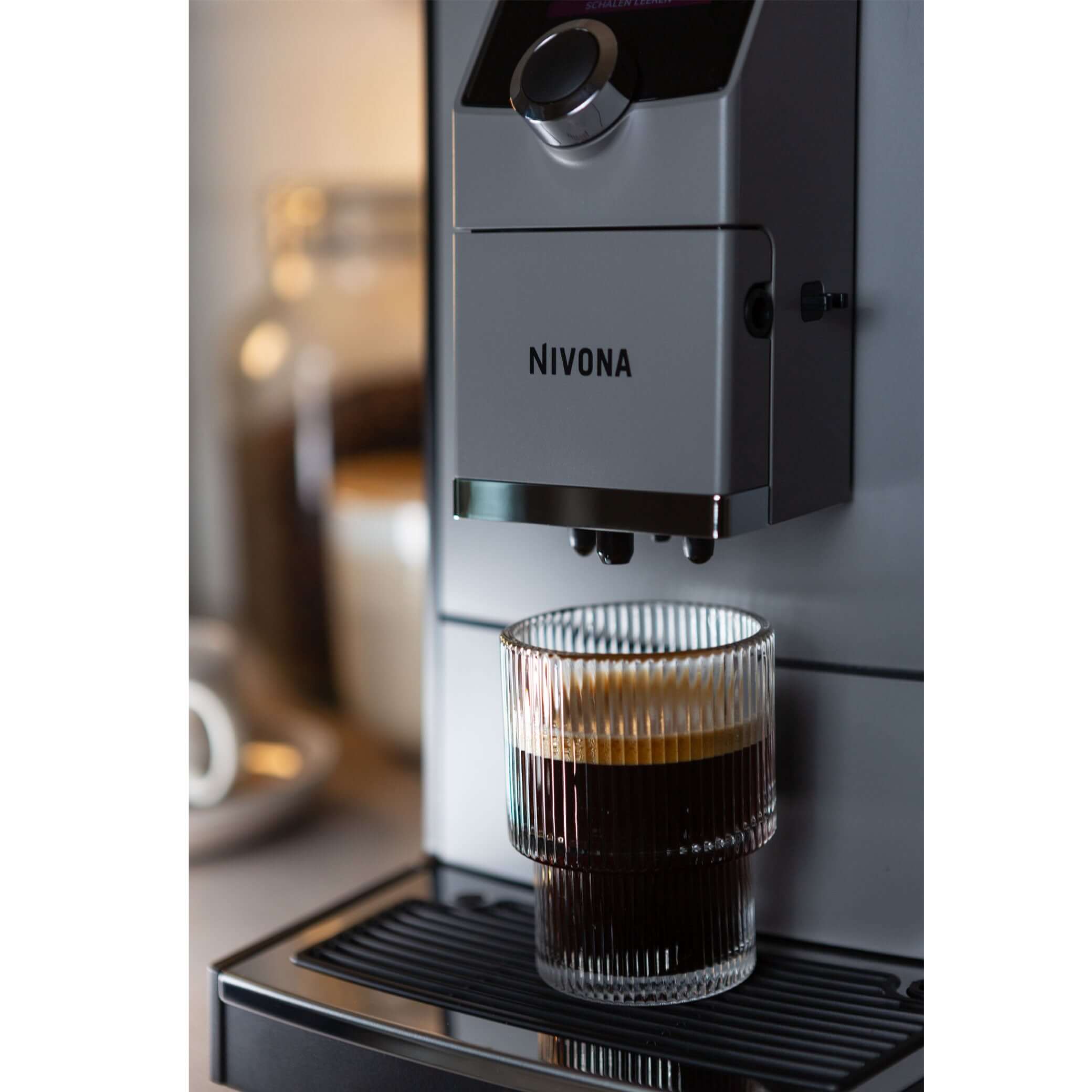 NICR 793 CafeRomatica Fully Automatic Espresso Machine brewing a latte macchiato.