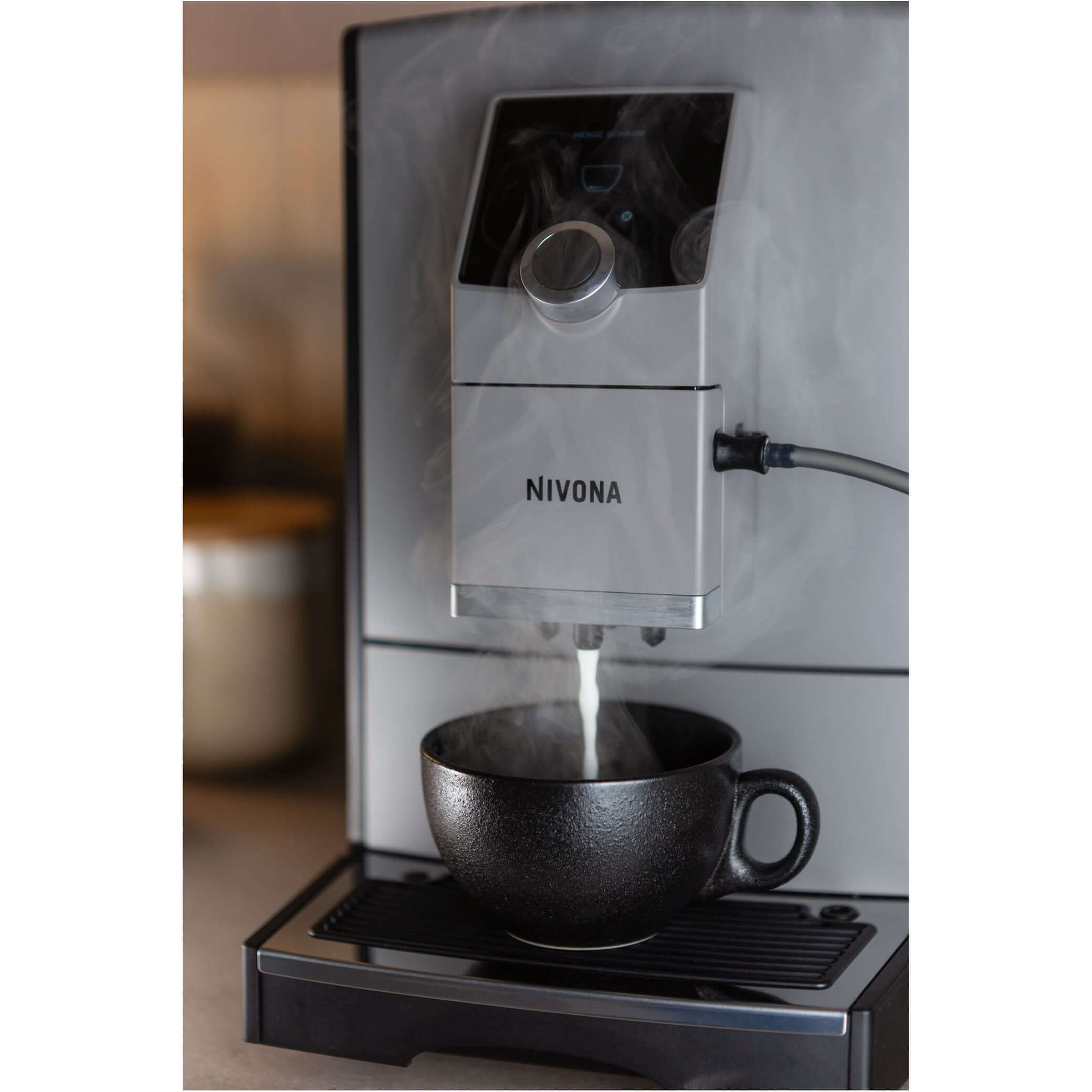 NICR 793 CafeRomatica Fully Automatic Espresso Machine brewing a latte macchiato.