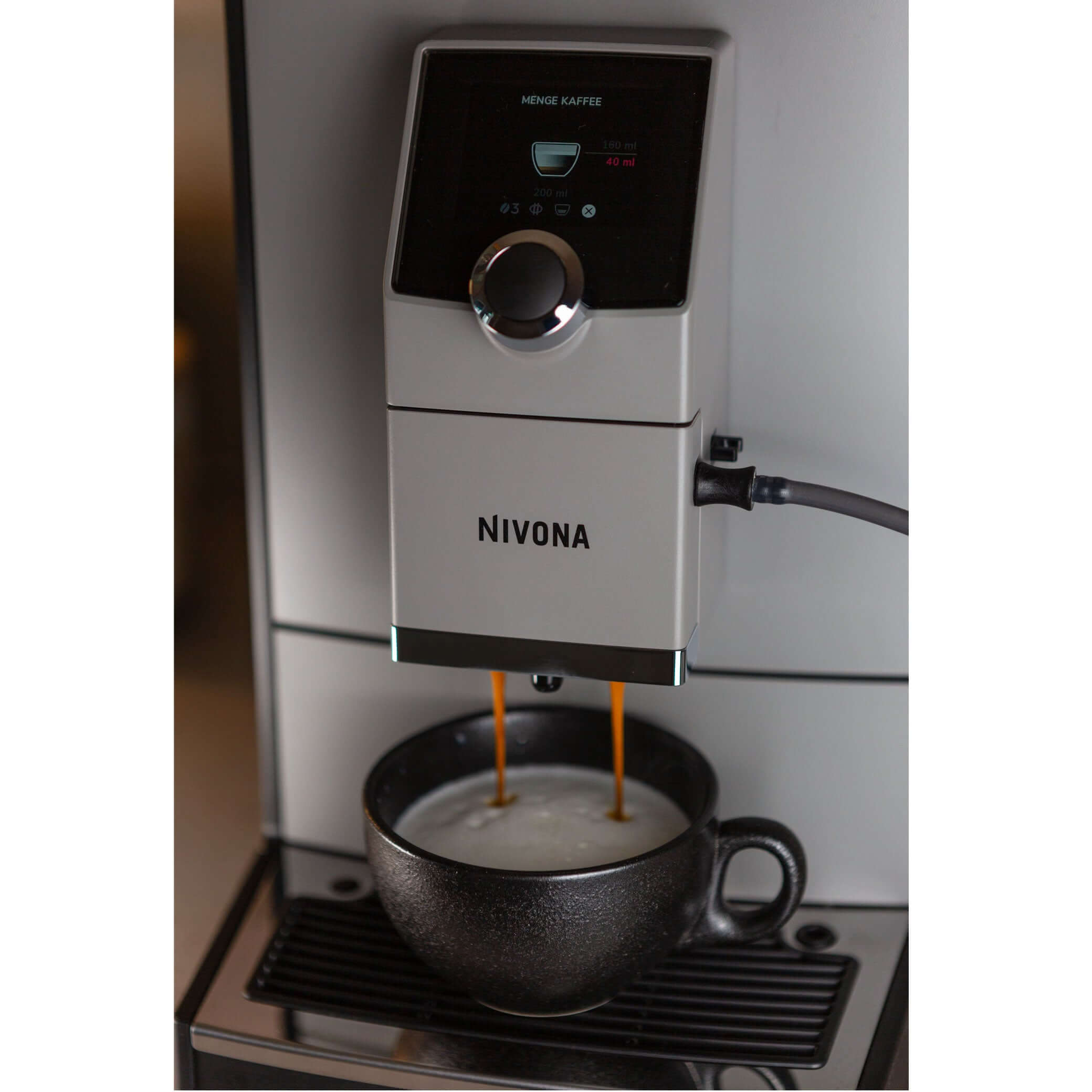 NICR 793 CafeRomatica Fully Automatic Espresso Machine brewing a latte macchiato.